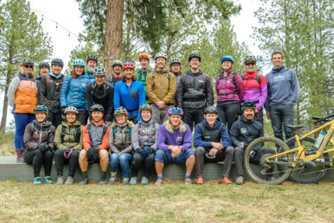 Mountain bike guides, coaches and shuttle drivers pose for a photo during Cog Wild's annual spring training. 